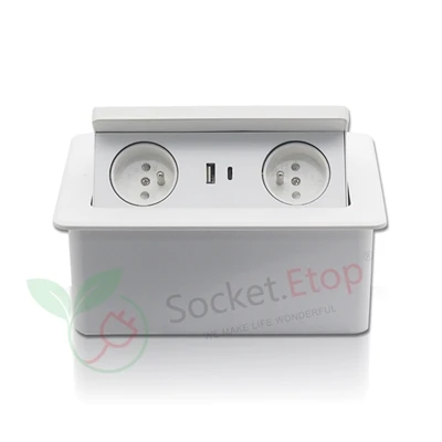 What is the damping mechanism in a pop up desk socket?